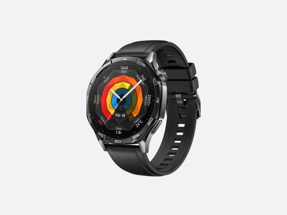 Close-up de um Huawei Watch GT 5 com caixa de aço inoxidável prateado e pulseira preta. O mostrador detalhado exibe diversas métricas de atividade e saúde (passos, calorias, sono, etc.) organizadas em anéis poligonais coloridos e ponteiros analógicos.