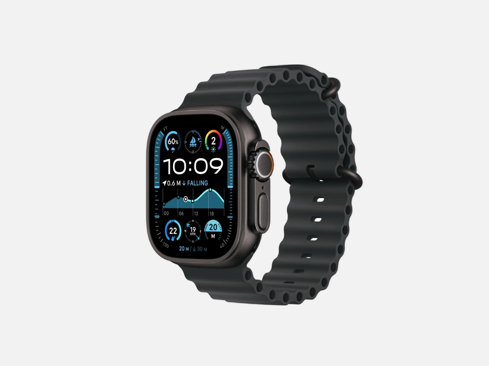 Smartwatch à prova d'água Apple Watch Ultra 3 em titânio preto com pulseira oceano, exibindo interface de mergulho e sensores de navegação avançados.